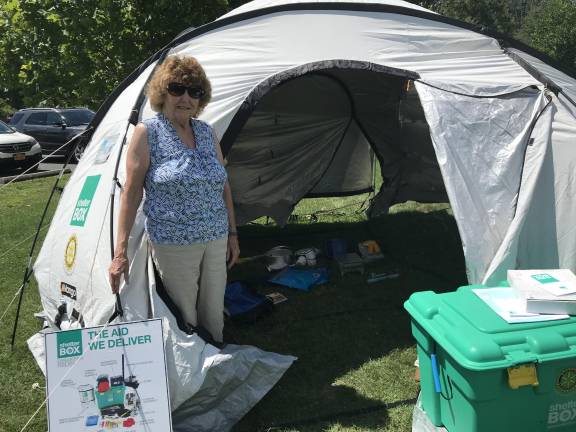 Rotarian Betty Ann Van Leeuwen at the Shelter Box exhibit.