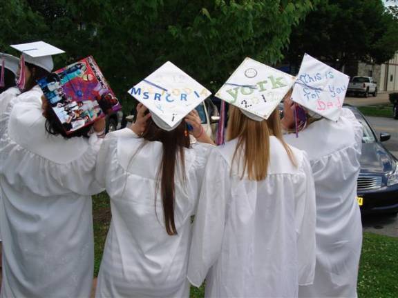 Meet Goshen's Class of 2012 It's hats on for these young ladies! Wearing "Class of 2012," Jordan Betro; "Misacordia," Laura Russo; "York," Lindsay Jackson; and "This is for you, Dad," Trisha Nelson, in honor of her father who passed away five years ago.