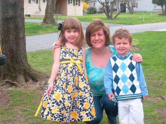 Mommy & Me Contest Kelly Eisenhardt of Sparta with her children on Easter Sunday a few years ago.