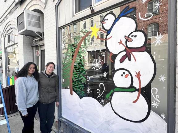 Chester Academy students decorate local shops with holiday scenes