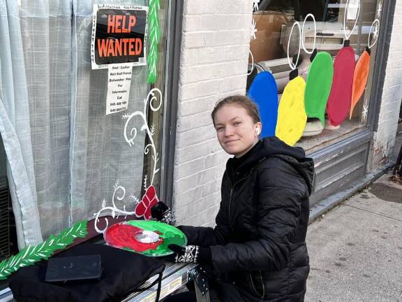 Chester Academy students decorate local shops with holiday scenes