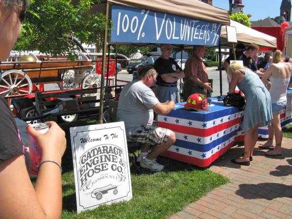 Scenes from Great American Weekend Folks sign up for the Cataract E&H raffle.