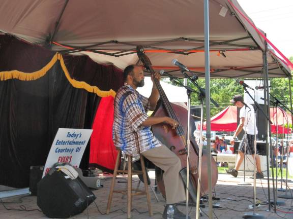 Scenes from Great American Weekend Christopher Dean Sullivan, a member of the Cornerstone Arts Alliance, on bass.