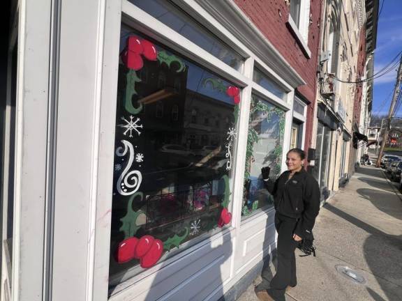 Chester Academy students decorate local shops with holiday scenes