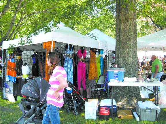 Great American Weekend brings on the crowds Colorful clothes for sale.