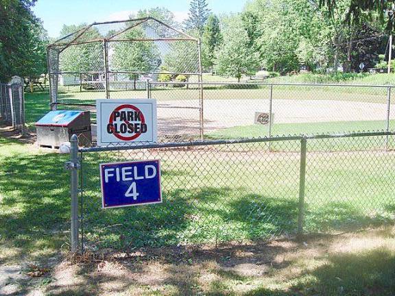 The ball field in this pocket park is closed due to overflowing sewage from the Hambletonian Pump Station on Craigville Road in Goshen.