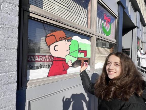 Chester Academy students decorate local shops with holiday scenes