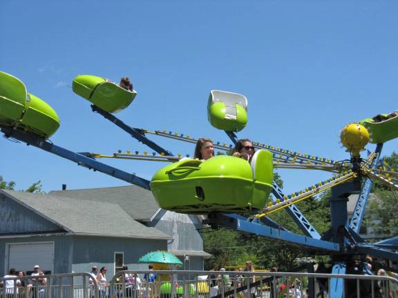 Goshen 2020 sharpens its vision Up, up, and away! at Great American Weekend, one of the many delights Goshen already offers as it casts its eyes on fresh new ideas for the future. The 34th annual Great American Weekend will be held July 4 (9 a.m.–5 p.m.), and Sunday, July 5 (10 a.m.-5 p.m.) (Great American Weekend 2014 photo by Ginny Privitar)