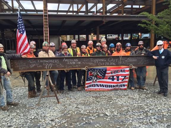 'Topping out' ceremony held at government center County Executive Steve Neuhaus poses with Local 417 Ironworkers (Photo provided)