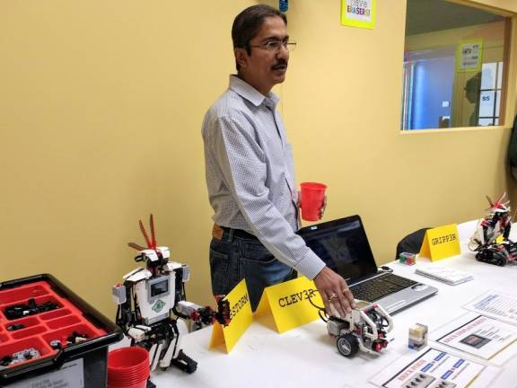 Vivek Sinha demonstrated a robot (Photo by Ginny Privitar)