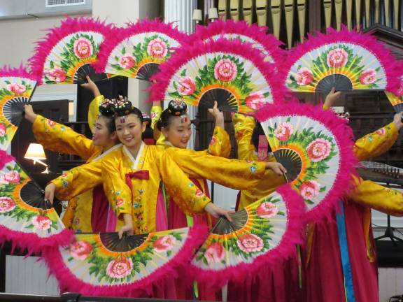 Korean Cultural Night dazzles the community A perfect Korean fan dance (Photo by Ginny Privitar)
