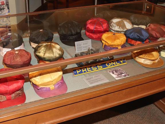 Harness Racing Museum & Hall of Fame Unveils Centennial Hambletonian Exhibit The display of caps work by drivers in past Hambletonians