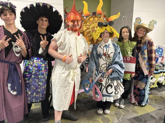 Goshen High wins Odyssey of Mind world championships The winning team in costume, from left: Cole Florio, 12th grade; Nathan Hulse, 11th grade; Aiden Thornell, 12th grade; Carly Seligman, 11th grade; Yujin Li, 11th grade; Madison Hunter, 10th grade. Sion Siljkovic was a member but could not make it to Worlds.