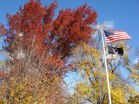 A stirring ceremony at Goshen memorial Flags are animated in the brisk air (Photo by Geri Corey)