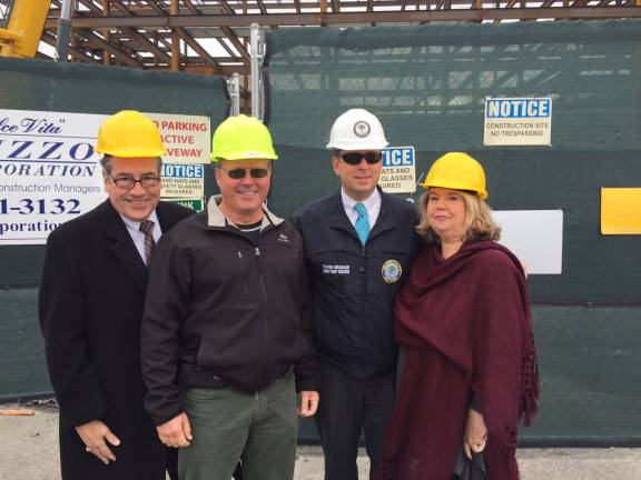 'Topping out' ceremony held at government center Orange County Court Judge Robert Freehill, Chairman of the Legislature Steve Brescia, County Executive Steven M. Neuhaus and Legislator Katie Bonelli (Photo provided)