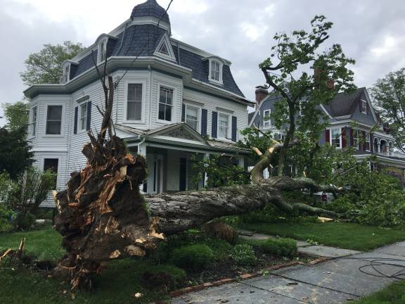 County waives tipping fees to aid in storm recovery efforts Photo by Erika Norton This home on South Church Street in the Village of Goshen got clipped but narrowly missed disaster.