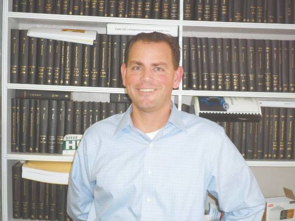New Dem. Party Chair has full house New Orange County Democratic Committee Chairman Brett Broge at his law office in Goshen. Photo by Nathan Mayberg