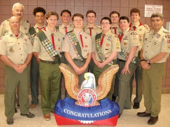 The Boy Scouts of Troop 63 who have attained the rank of Eagle Scout -- front row (from left): Anthony Palazolla, Generation Leader; Conor Donovan; Jack DeClerck; Nicholas Brown; Anthony Palazolla; and Jeff Albanese, Scoutmaster. Back: Tom Henkler,&#xa0; Generation Leader; Theodore A. Riley; Liam Kelly; Max Heinrich; Owen Henkler; and Camden Olivero. (Photo by Geri Corey)