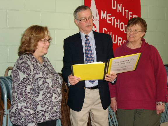 Teacher who bucked 'Black Law' still inspires Narrator Bruce Crandall (center) talks with Orange County Genealogy SocietyProgram Coordinator Anna Calli (on his right) and President Marilyn Terry about his ancestor Prudence Crandall. (Photo by Geri Corey)