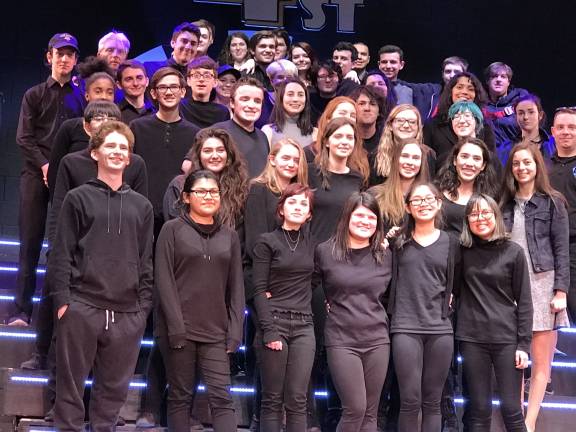 Nothing happens on stage without the hard work of the members of the stage crew. In a rare moment, they pose together following the last performance.