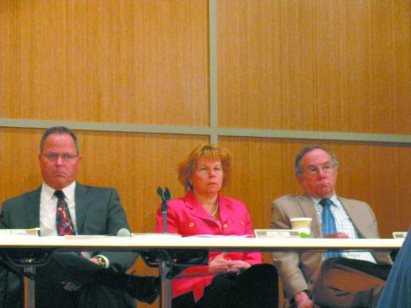 Legislature OKs nursing home transfer From left: Stephen Brescia (R-Montgomery), Chairman of the Legislature; Antoinette Reed, Legislative Attorney; and Jeffrey Berkman (D-Middletown). (Photo by Ginny Privitar)