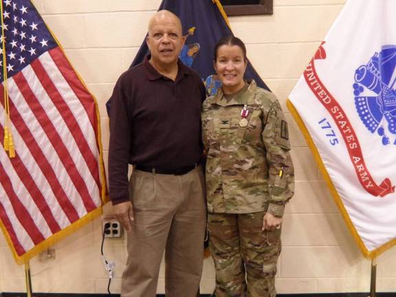 Isabel Smith of Goshen promoted to Colonel in Army National Guard Col. Isabel Smith poses with her husband, Peter, following her promotion on Nov. 5 at Camp Smith Training Site. She was also awarded the Meritorious Service Medal