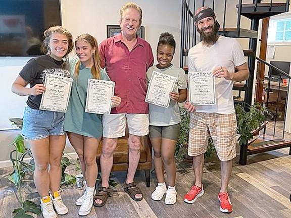 Left to right: Level 2 graduates Misha G; Polina; David Wilson; Fabienne Justin and Habibi Rodriguez