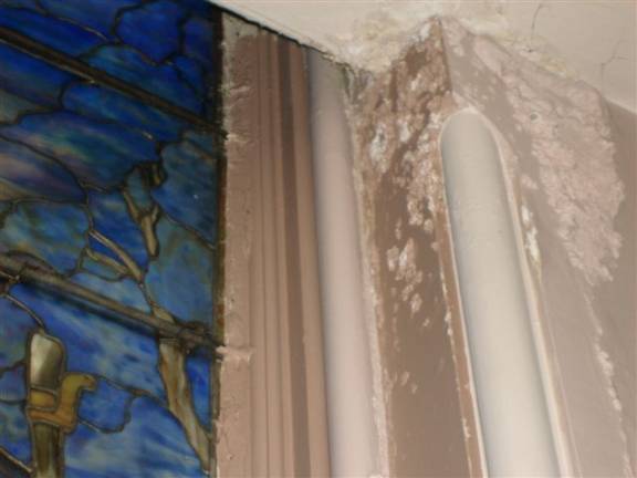 Church receives estimates for Tiffany window restoration Photo by Geri Corey This photo shows the water damage to the frame work that, left unrepaired, could cause the loss of the Tiffany window "Christ and the Pilgrims."