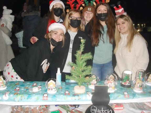 The All Night Graduating Class 2021 gather happily with their homemade items ready for purchase, hoping to further their fund-raising efforts for their graduation party, coming up at the end of their senior year.