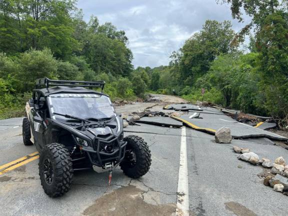 A Park Police UTC responds to road collapse.