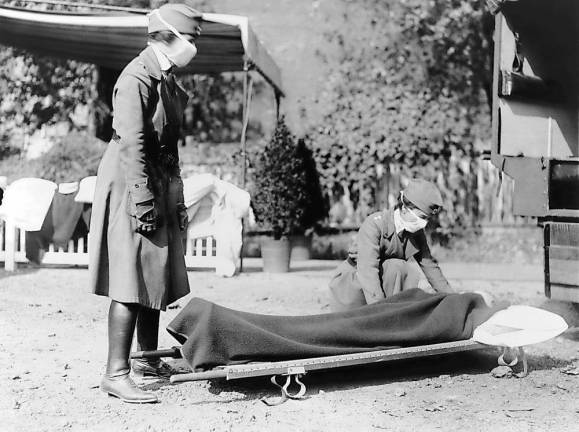 Then and now Demonstration at the Red Cross Emergency Ambulance Station in Washington, D.C., during the influenza pandemic of 1918. Library of Congress.