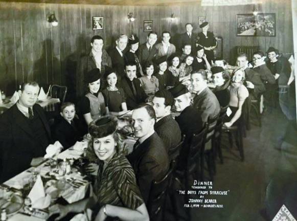 'All kinds of musical things' Joseph Gargiulo is the fifth person on the right side of the table (with backs to the camera). With him is a young Burl Ives (lower left corner, facing the camera) at a dinner celebrating “The Boys from Syracuse.” (Photo provided)