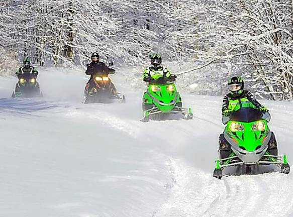 NY courts out-of-state tourists with free snowmobiling weekend