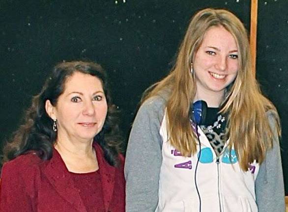 High school students honored as 'Goshen Greats' Brielle Watts with science teacher Deborah Schulz