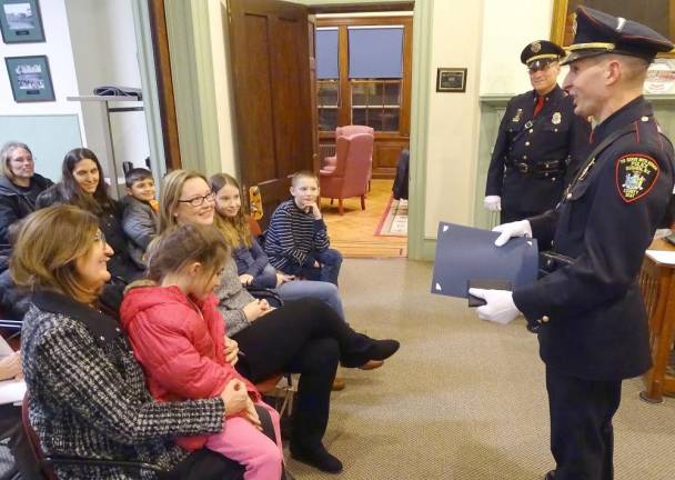 Investigator Michael Gregorio, a champion of vulnerable children, retires from village police department Inv. Michael Gregorio addresses family and friends at Village Hall