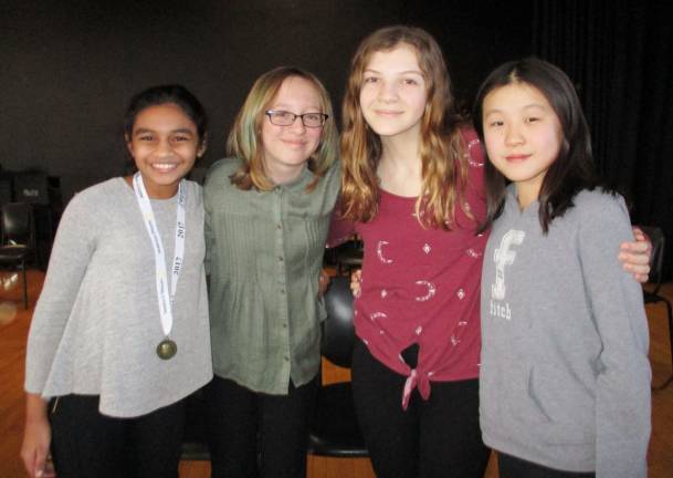 Eesha Ramanathan wins school competition of National Geographic Bee From left: Eesha Ramanathan, Bridgette Bennis, Virginia Valens and Annie Shih (Photo provided)