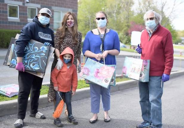 Simcha (joy) for seniors: Chabad presents art, cards and sweets for the staff and residents of W Senior Living in Goshen at Chabad’s Honk for Heroes Car Parade.