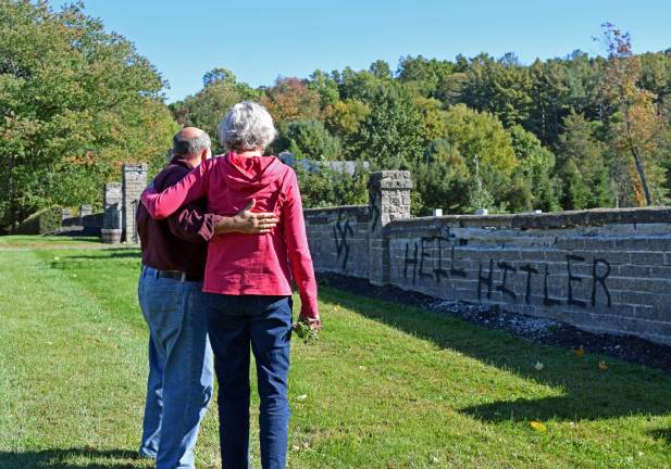 Jewish cemetery desecrated with anti-Semitic graffiti days before Yom Kippur Photos by Erika Norton Ellen and Jerry Sander visit the Temple Beth Shalom cemetery in Warwick, which was vandalized over the weekend with anti-Semitic graffiti.