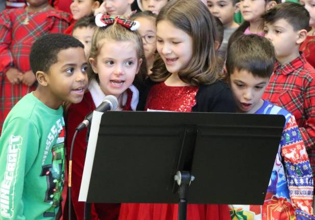 Scotchtown Avenue first graders delight with holiday concert