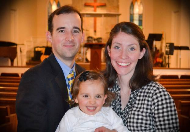 After long wait, Goshen Christian welcomes new pastor Goshen Christian Reformed Church members welcomed their new pastor, the Rev. Samuel Sutter; his wife, Ashley and daughter, Colette (Photo by Jon Baker)