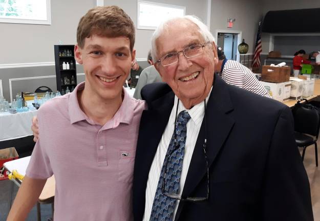 Alex Prizgintas (left) with Norm Heckler (right), noted authority and auctioneer who has worked as a consultant for Corning Museum of Glass, Old Sturbridge Village, the Wadsworth Athenaeum and the National Bottle Museum.