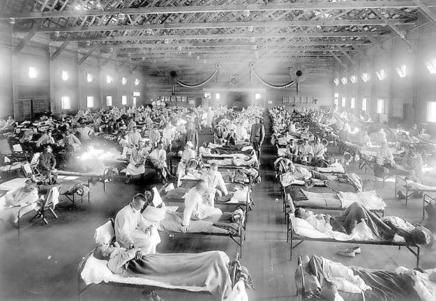 Influenza victims crowd into an emergency hospital near Fort Riley, Kansas, in this 1918 file photo. The 1918 Spanish flu pandemic killed at least 20 million people worldwide and officials say that if the next pandemic resembles the birdlike 1918 Spanish flu, to 1.9 million Americans could die.