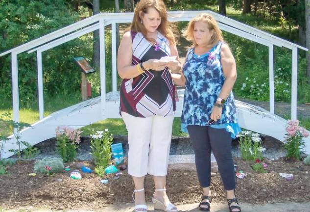 Susan Barberi and Iris Ferraro speak at the bridge dedication.