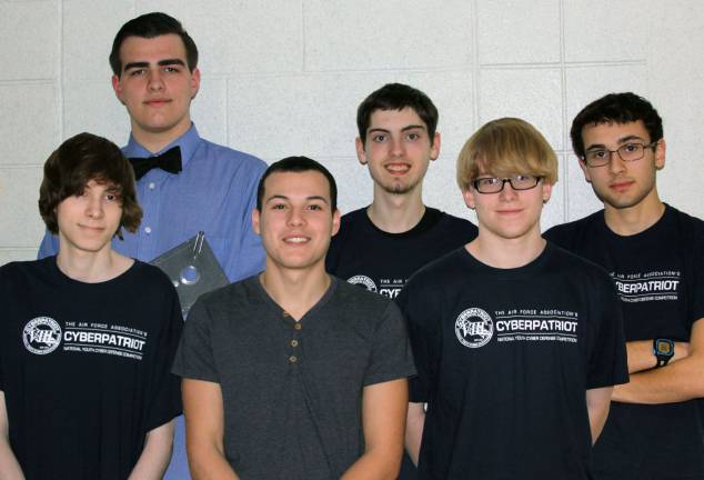 They really get IT Photo provided by Orange-Ulster BOCES CTE From left to right, CyberPatriot Gold Tier regional winners are: Brendan Rasenberger (Warwick Valley, Edward Green (Pine Bush), Elmer Palmer (Chester), Mark Hyatt (Pine Bush), Magnus Roberto (Pine Bush) and Camerin Figueroa (Pine Bush).