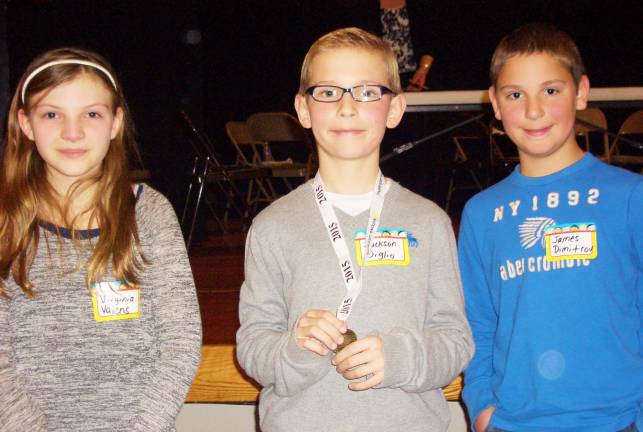 Jackson Diglio wins geography bee From left: Virginia Valens, second place; Jackson Diglio, first place; and James Dimitrov, third place. (Photo by Carissa Bayack)