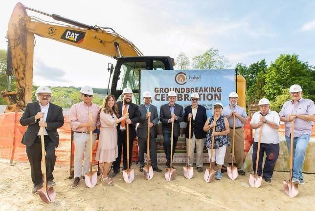 Pictured from left to right are: Chabad Gabbi Ira Kanis of Monroe, architect Arthur Chabon, Chana and Rabbi Pesach Burston, Orange County Executive Steve Neuhaus, Monroe Mayor Neil Dwyer, Chabad President Gil Goetz of Monroe, Stacey Finkelstein of Middletown, David Dixler of Monroe, Lester Pleeter of Chester and Al Muhlrad of Goshen at the Chabad Campus Groundbreaking Celebration. Photo credits: Nechama K. Photography/Chabad