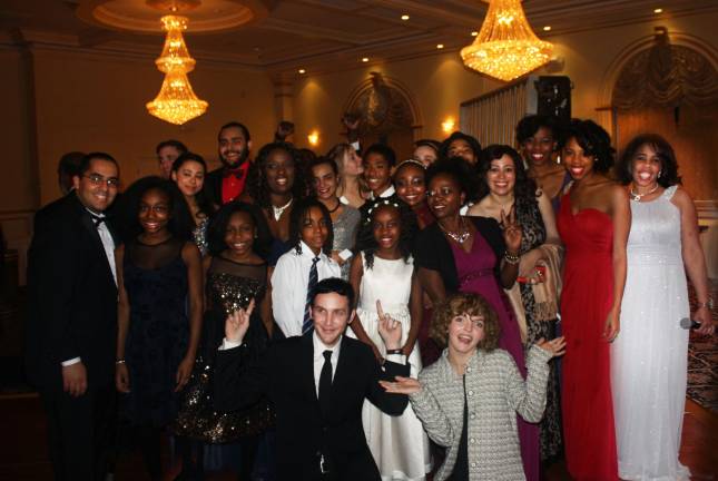 Gotham comes to Goshen for 'His Majesty' Actors Robin Lord Taylor and Camren Bicondova get in front of the crowd for a group shot at the Orange County Gospel Fellowship fundraiser (Photo provided)