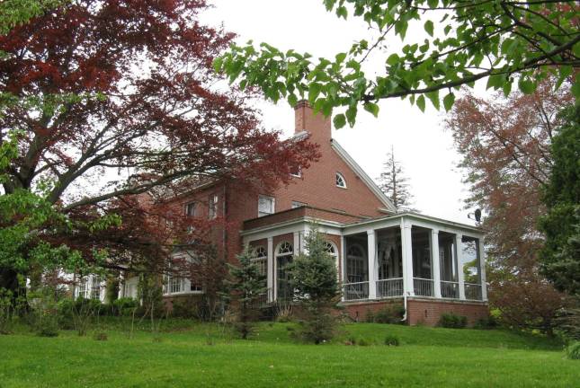 Union and disunion Photo by Ginny Privitar Brigadier General Henry L. Burnett's summer home in Goshen. It's located on the Old Chester Road, which also runs by Slate Hill Cemetery, where he is buried. He lived here in summers, racing at the track. He contracted pneumonia here and returned to his home in New York City, where he died in 1916. He was brought to Goshen for burial. This house was also occupied at times by Westinghouse family members and later, by the Gabor sisters, who at one time hired Margo George to run a spa there.