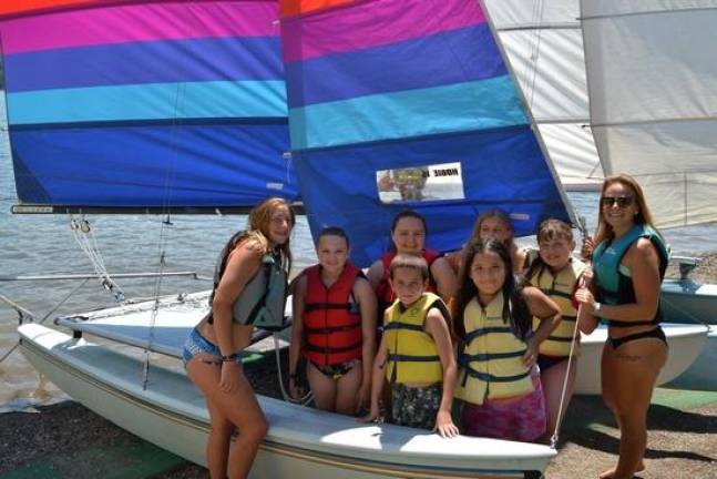 Sheriff DuBois sends local kids to summer camp Campers go sailing