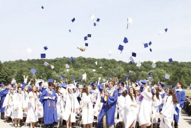 Goshen High School: 'Today as we climb' Hats and spirits soared after the Class of 2013 received their diplomas. (Photo by Jerry Goldberg)